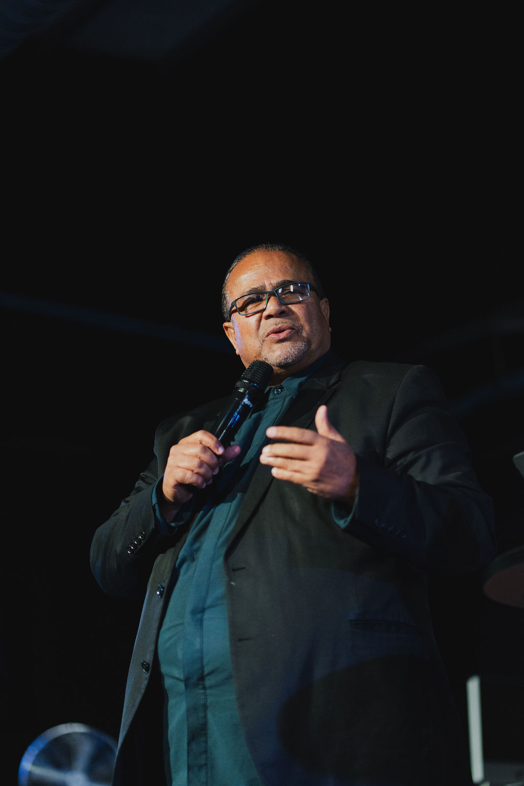 Apostle on stage at New Hope Church